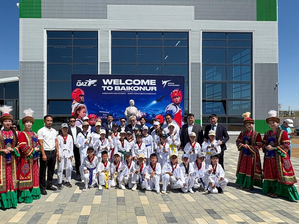 World Taekwondo and Kazakhstan delegation members gather at Baikonur to commemorate the launch of the WT flag into orbit